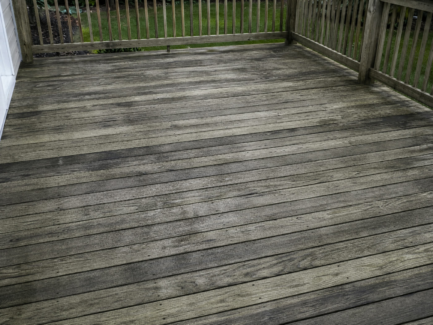 Wood deck before pressure washing